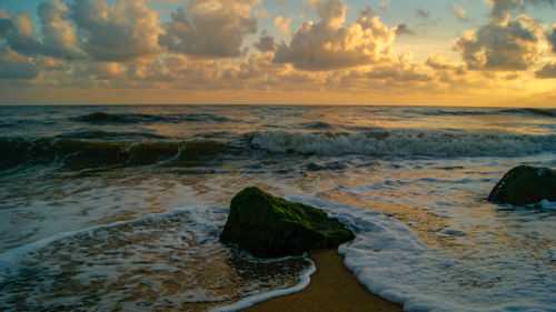 Scenic view of sea against sky during sunset