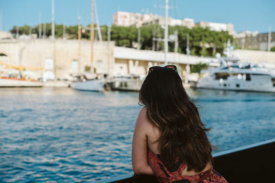 Rear view of woman looking at sea