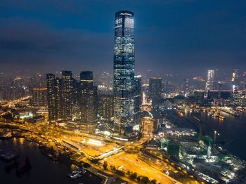 Illuminated buildings in city at night