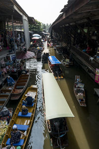 High angle view of people on boat in water