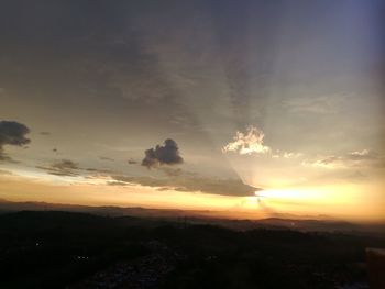 Scenic view of landscape against sky during sunset