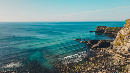 Scenic view of sea against clear sky