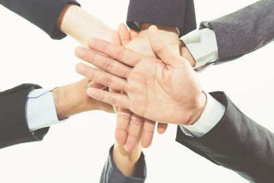 Midsection of man holding hands