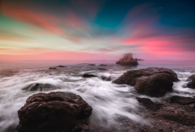 Scenic view of sea against sky during sunset