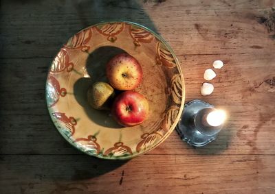 High angle view of fruits in bowl on table