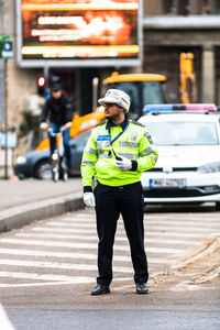 Full length of man standing on street