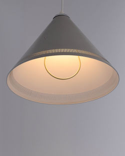 Low angle view of illuminated pendant light