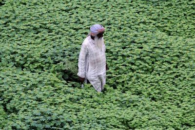 Woman standing in field