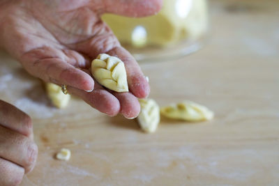 Close-up of hand holding food