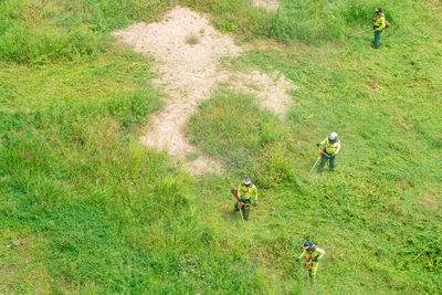 High angle view of people on field