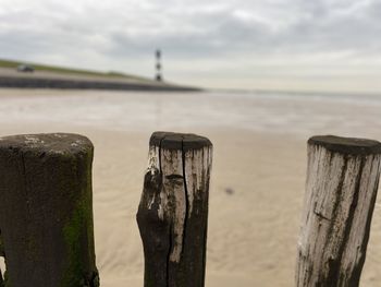 Close-up of wooden post on fence