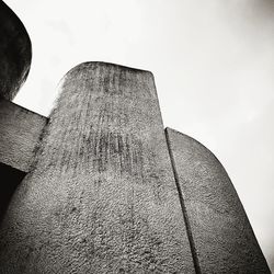 Low angle view of sculpture against sky