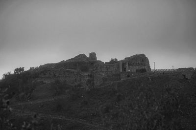 Old ruin building against clear sky