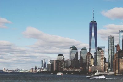 New york city view against cloudy sky 