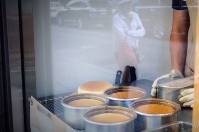 Cropped image of man preparing food in restaurant