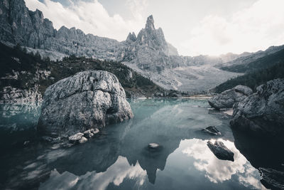 Scenic view of rocks in mountains against sky