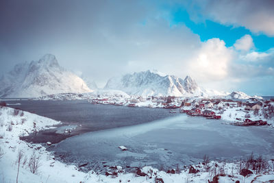 Scenic view of snowcapped mountains against sky