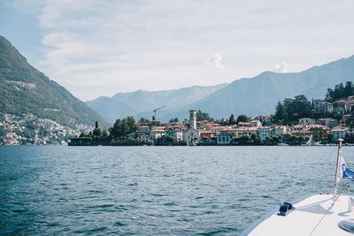 Boats in sea against sky