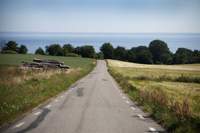 Country road going through rural landscape, skane, sweden