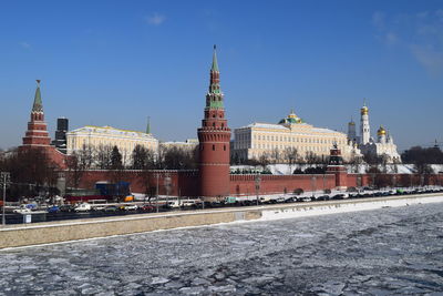 View of moscow city against clear blue sky