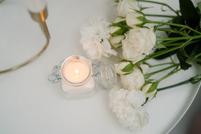 Close-up of white flowers on table