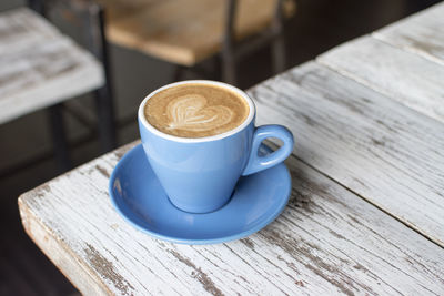High angle view of coffee on table