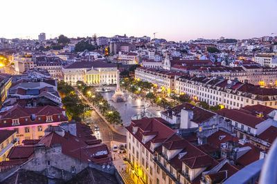 High angle view of buildings in city against sky