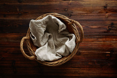 High angle view of bread in basket on table