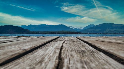 Surface level of pier against sky