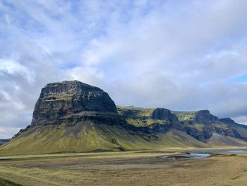 Scenic view of rock formations against sky