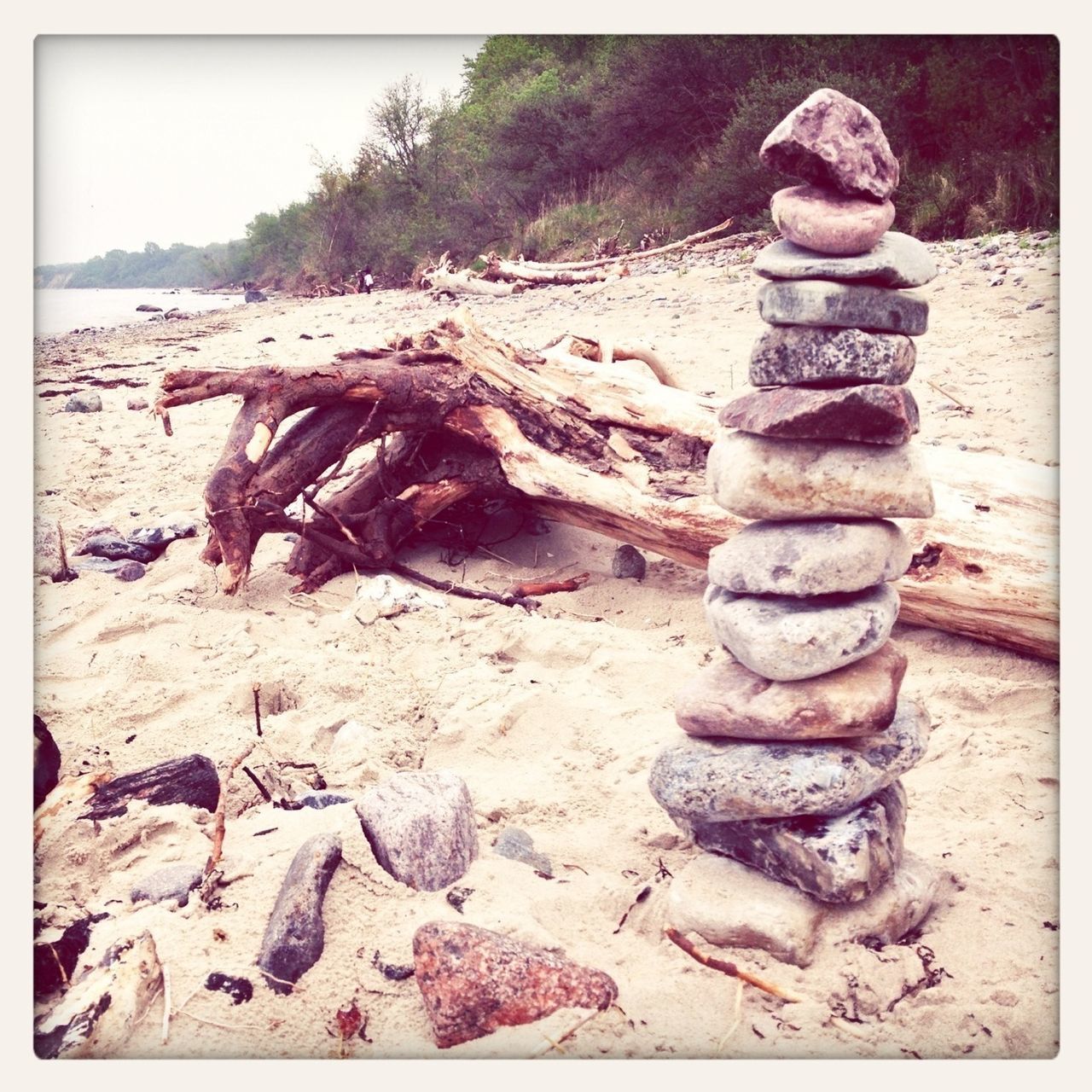 beach, sand, transfer print, tranquility, rock - object, stack, auto post production filter, nature, stone - object, wood - material, tranquil scene, tree, log, day, shore, sunlight, stone, outdoors, deforestation, no people