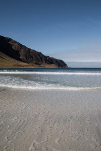 Scenic view of sea against clear sky