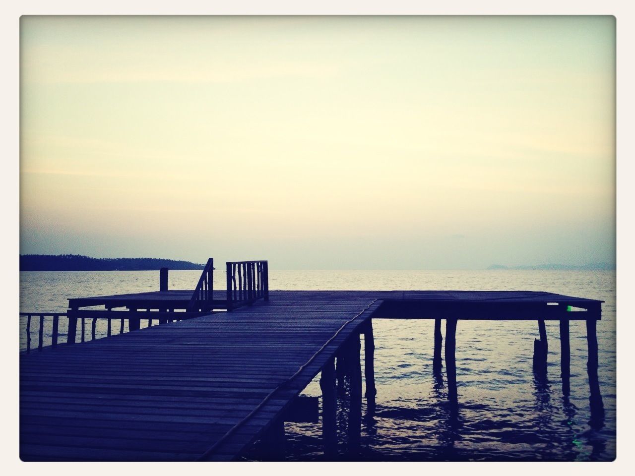 water, sea, pier, tranquil scene, tranquility, horizon over water, scenics, railing, beauty in nature, sky, jetty, nature, wood - material, transfer print, idyllic, auto post production filter, sunset, built structure, calm, ocean