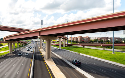 View of bridge against cloudy sky