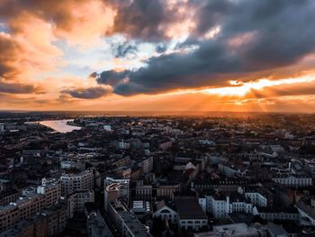 High angle view of city at sunset