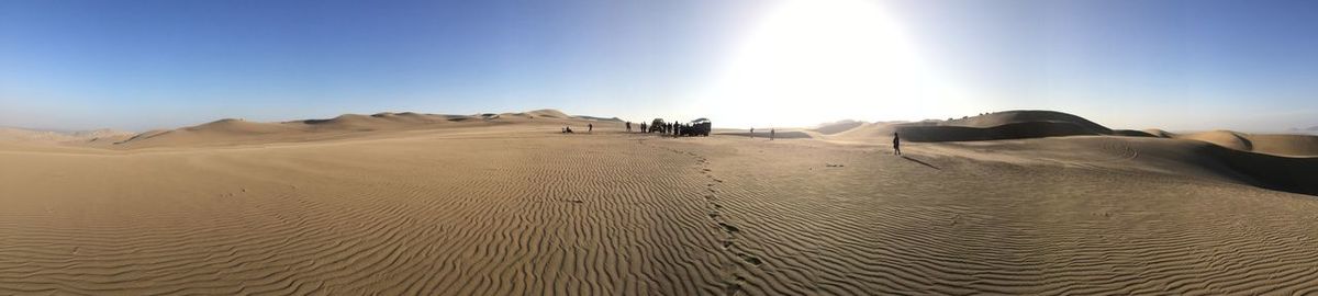 Scenic view of desert against clear sky