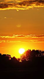 Scenic view of sunset over landscape