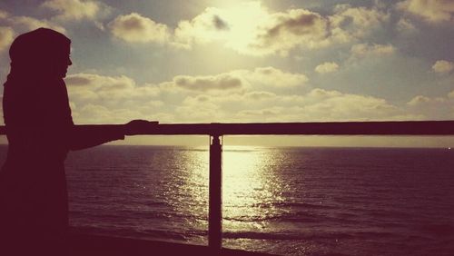 Scenic view of sea at sunset