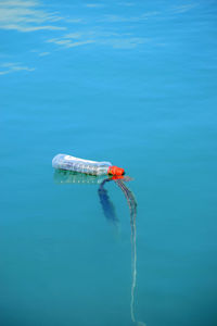 High angle view of plastic floating on sea