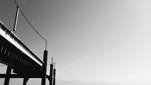 Low angle view of bridge against clear sky