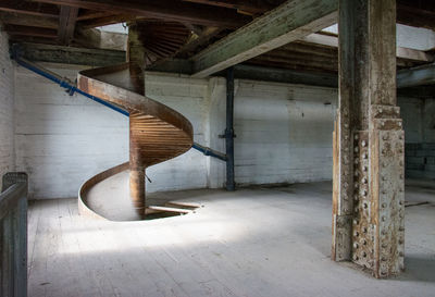 Spiral staircase in abandoned building