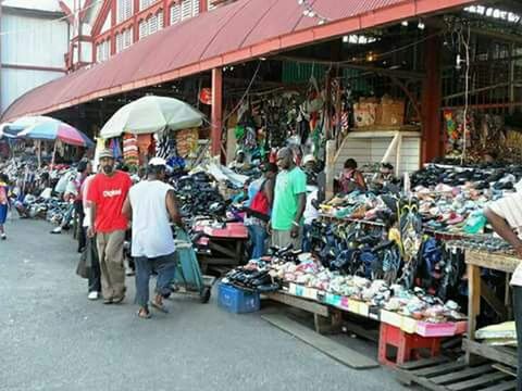 market, market stall, retail, men, for sale, large group of people, person, street market, small business, selling, large group of objects, abundance, choice, shopping, street, sale, variation, consumerism, lifestyles