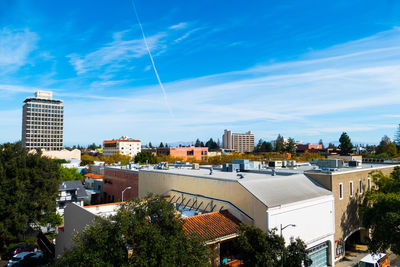 Cityscape against blue sky