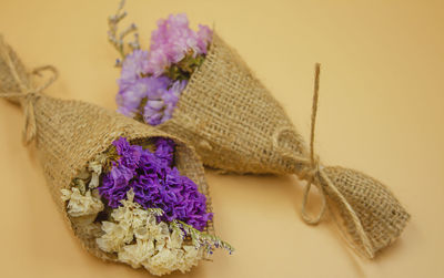 Close-up of purple flowers on table