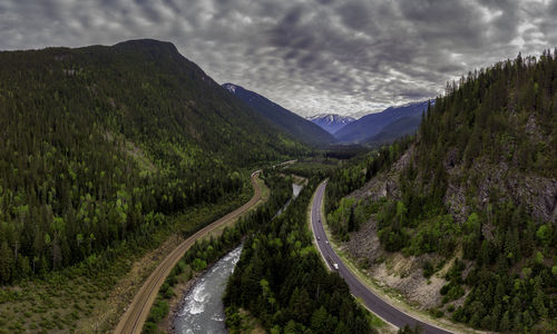 Panoramic view of road amidst mountains against sky