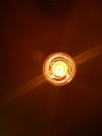 Low angle view of illuminated spiral staircase
