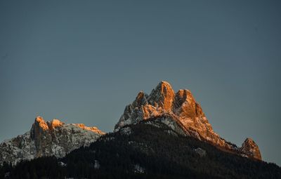 Low angle view of rock formation against sky