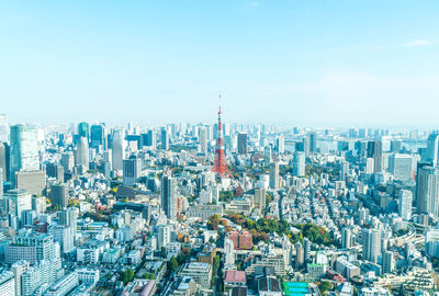 High angle view of city buildings against sky