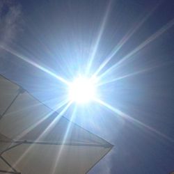 Sun shining through clouds