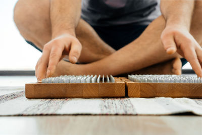 Close-up of man working on table